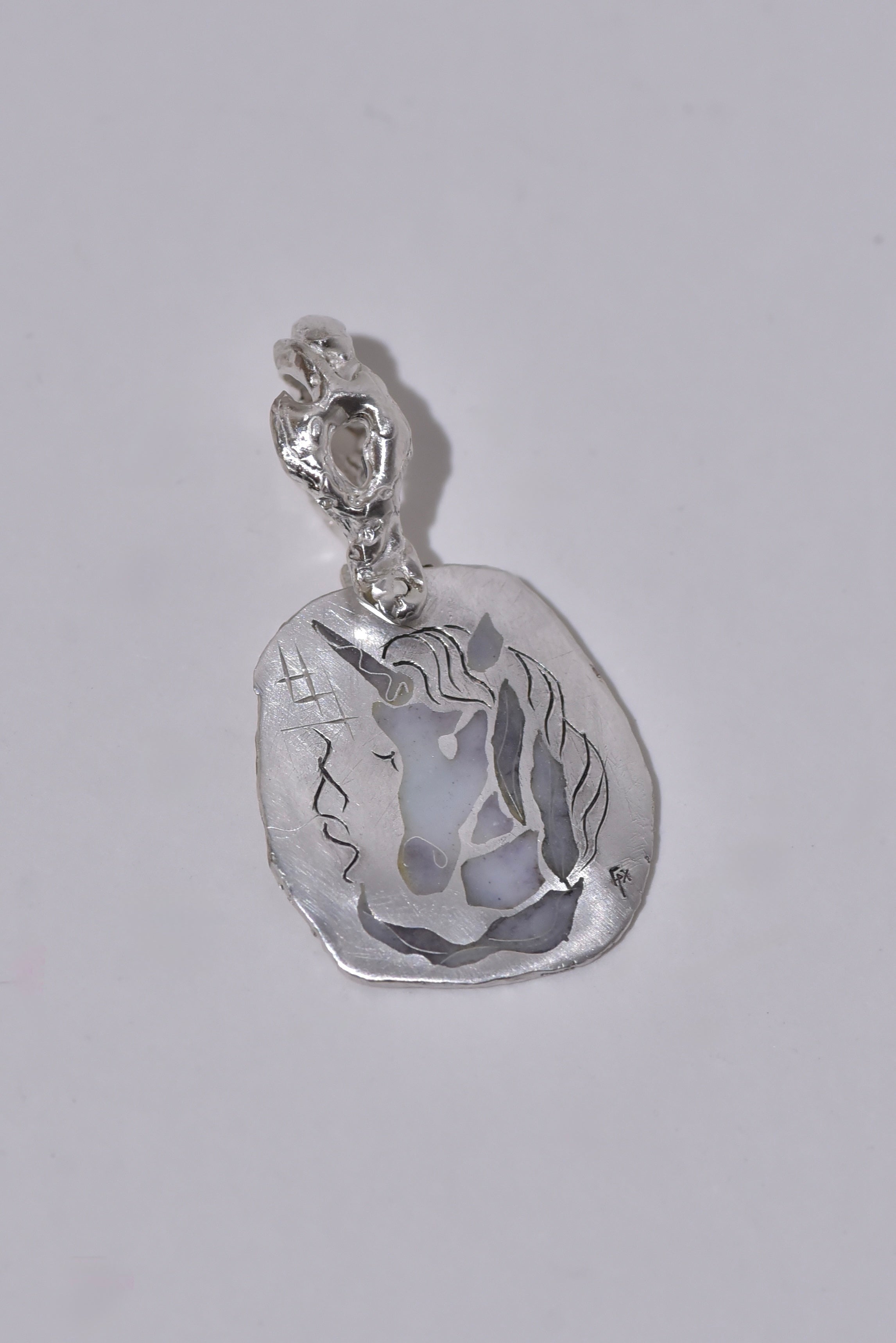 Unicon pendant top