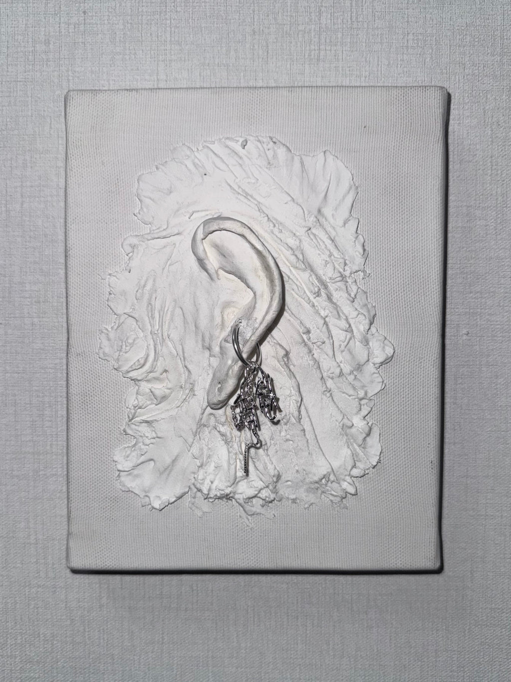 LOGO play ear cuff