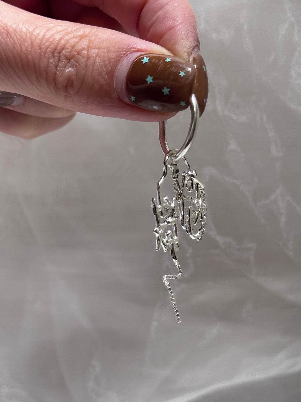 LOGO play ear cuff