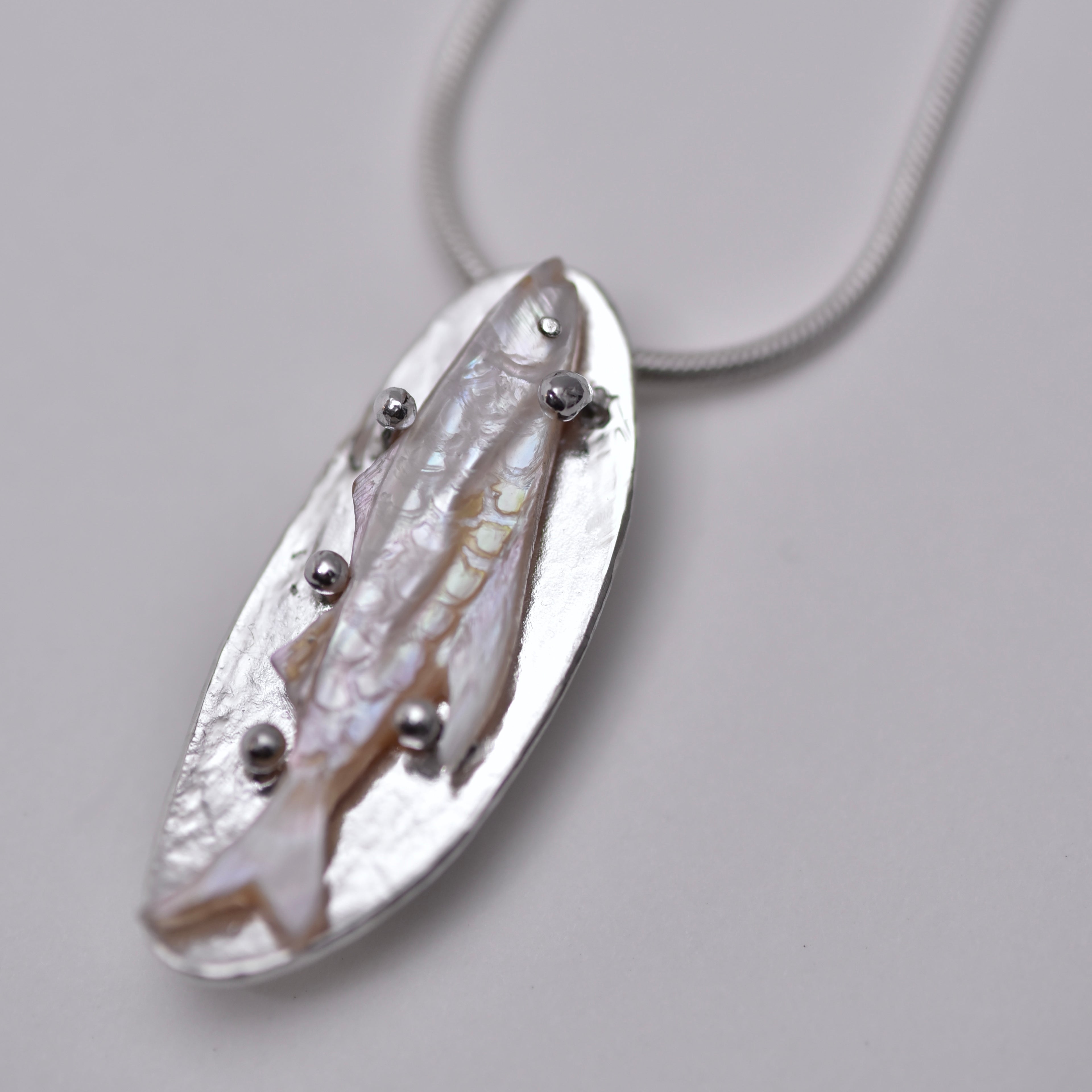 A fish... Pendant necklace