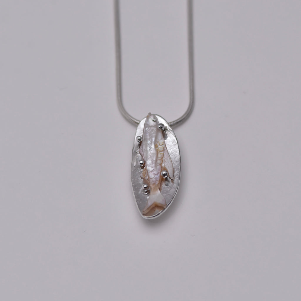 A fish... Pendant necklace
