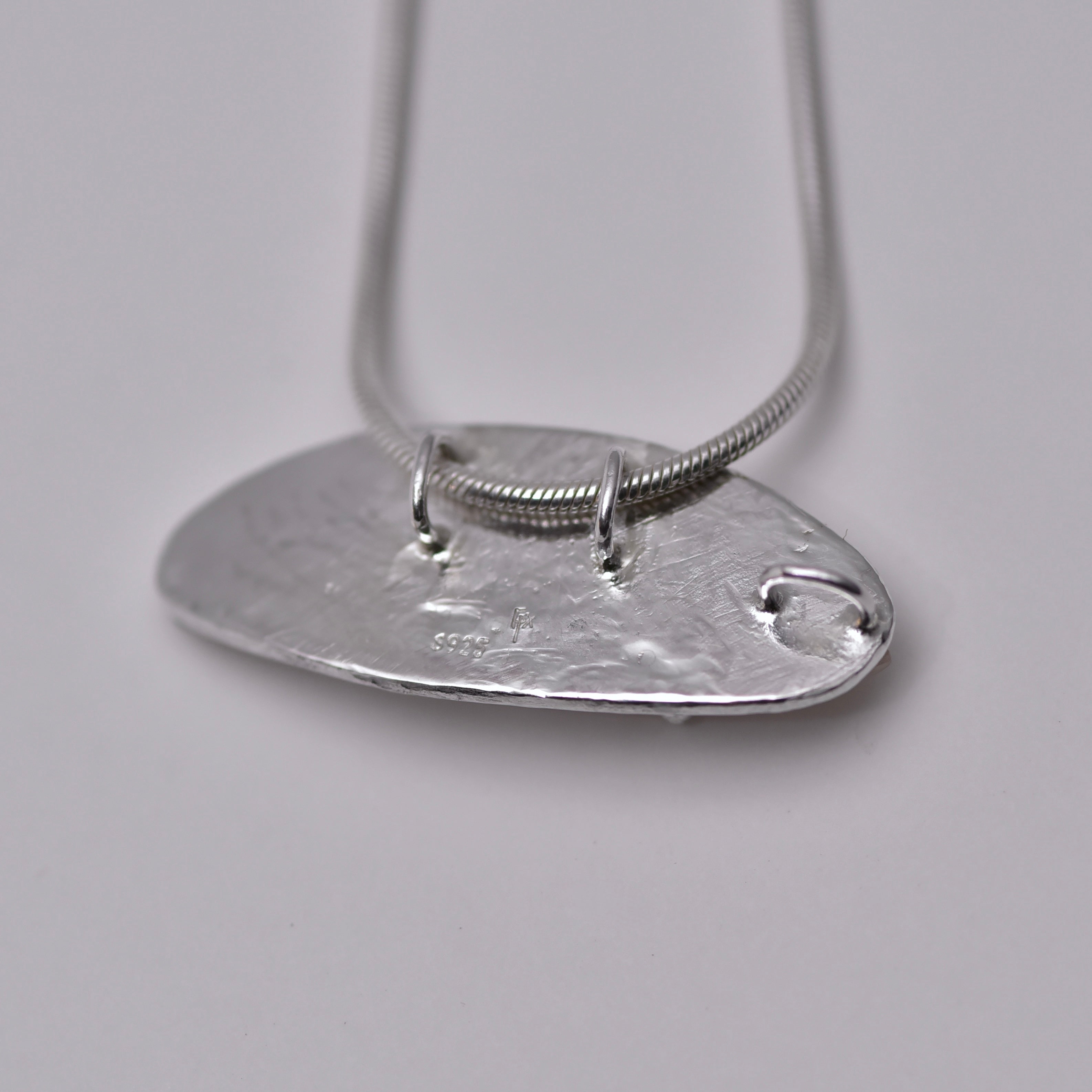 A fish... Pendant necklace