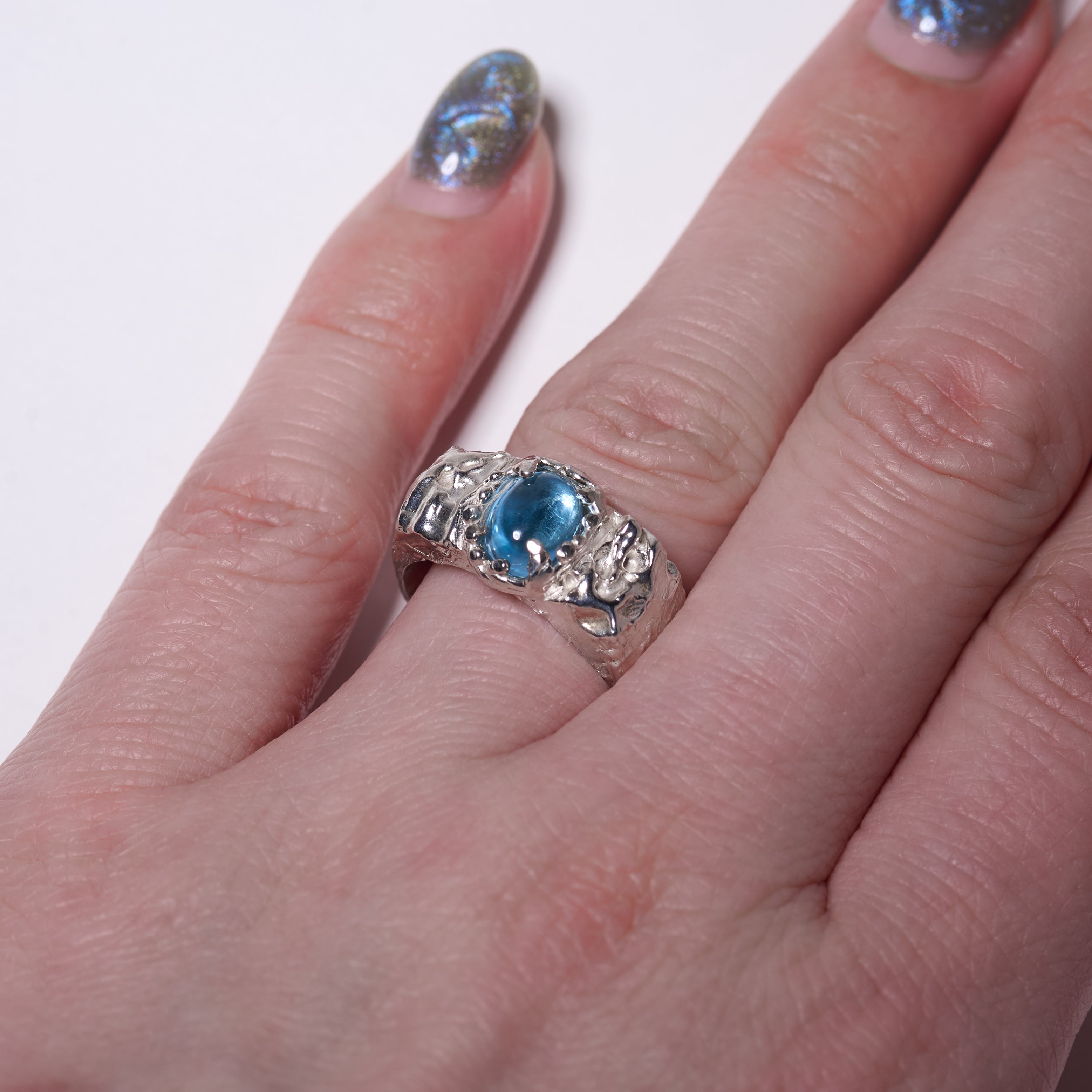 Blue topaz ring