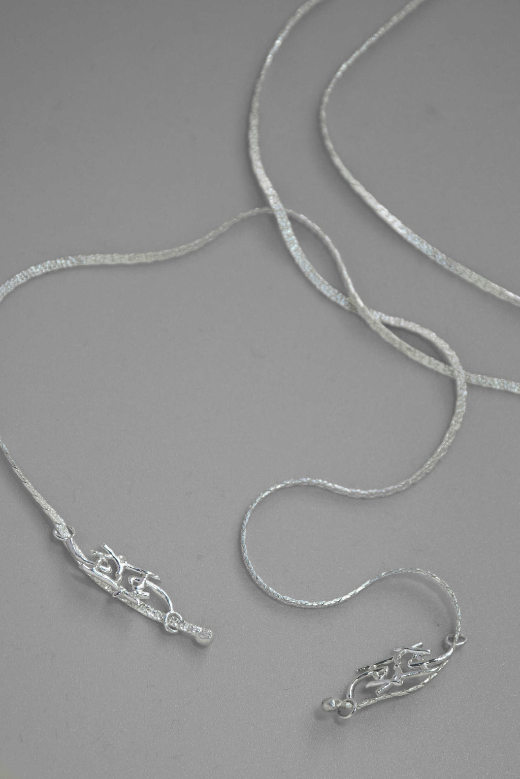 Logo tie necklace