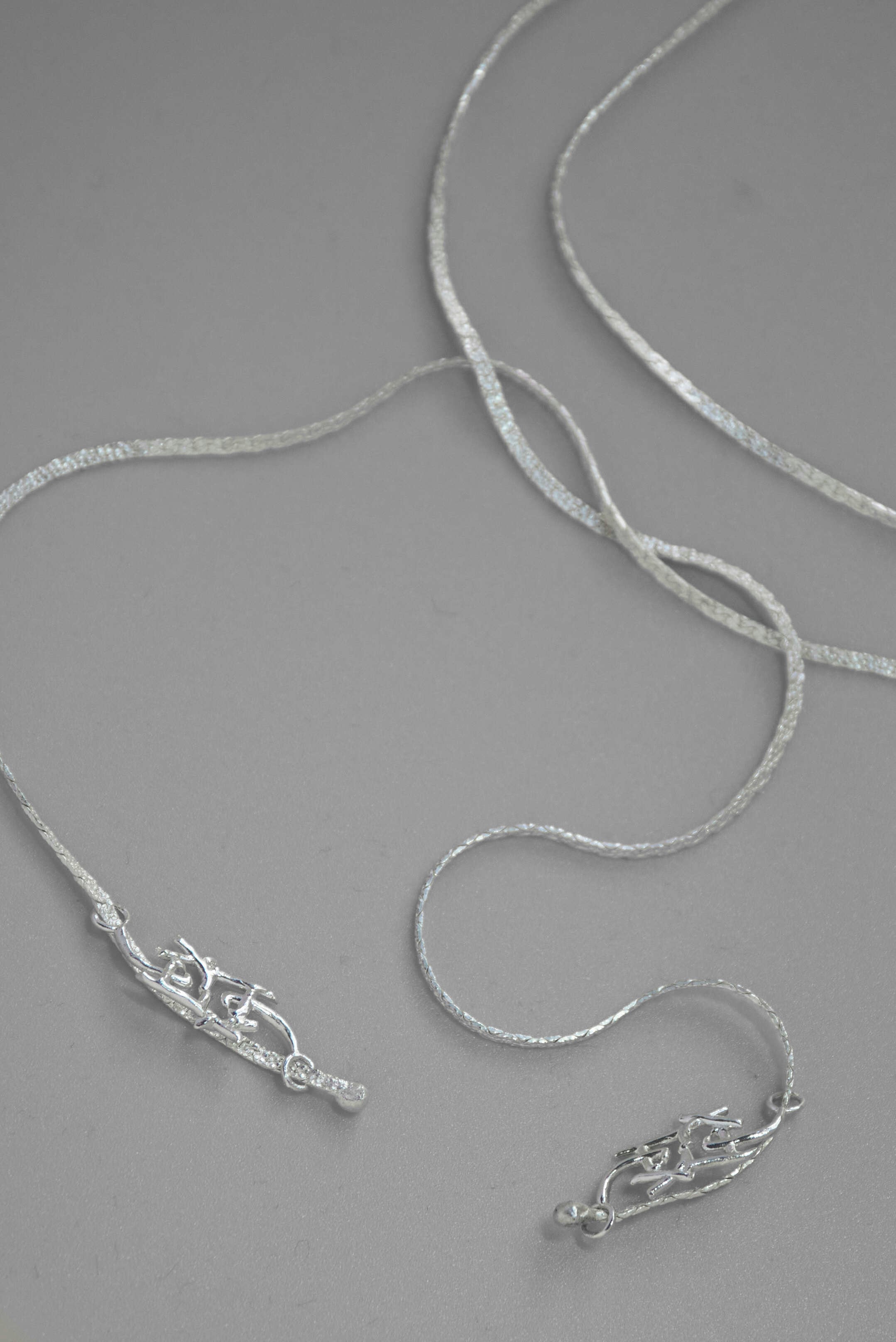 Logo tie necklace
