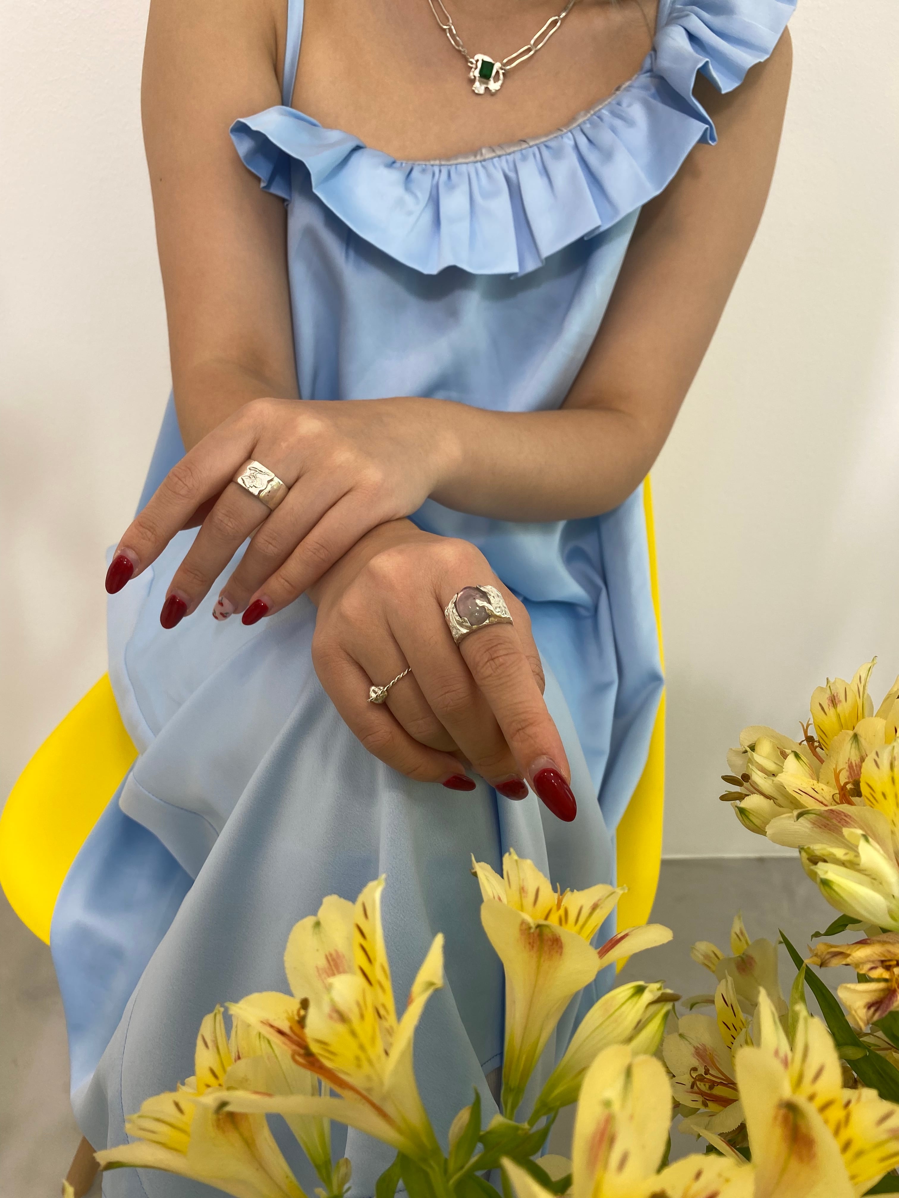 Distorted rose design ring